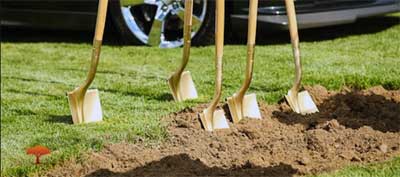 Photo of shovels in ground