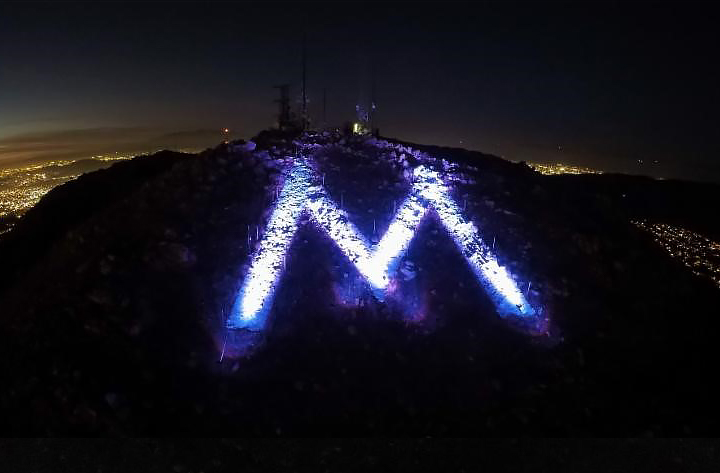 the "M" lit purple