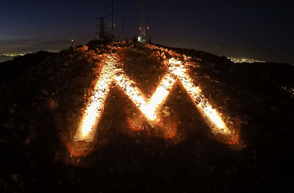 the "M" lit orange